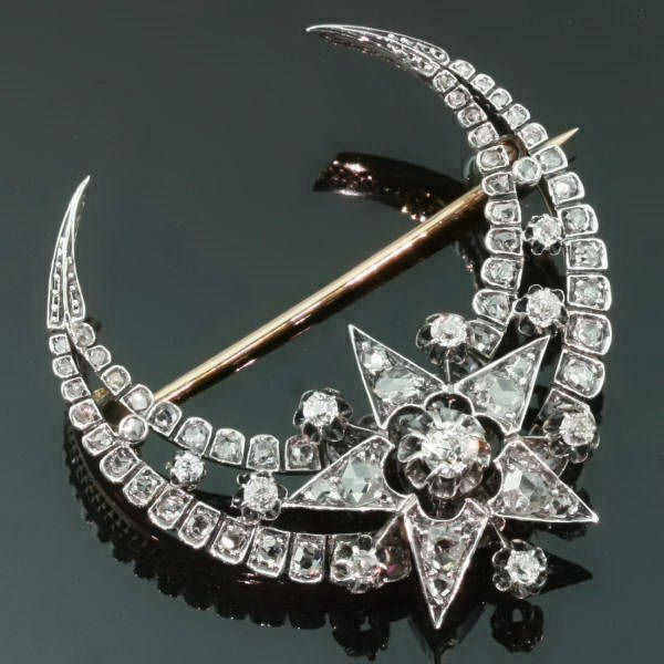 Victorian crescent moon and star brooch with old miners and rose cut diamonds